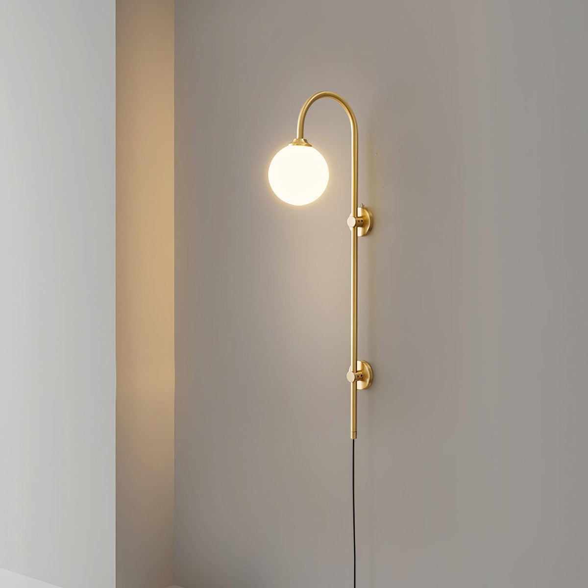 Solenne Globe Brass Plug-in Wall Sconce