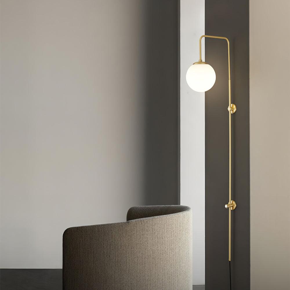 Solenne Globe Brass Plug-in Wall Sconce