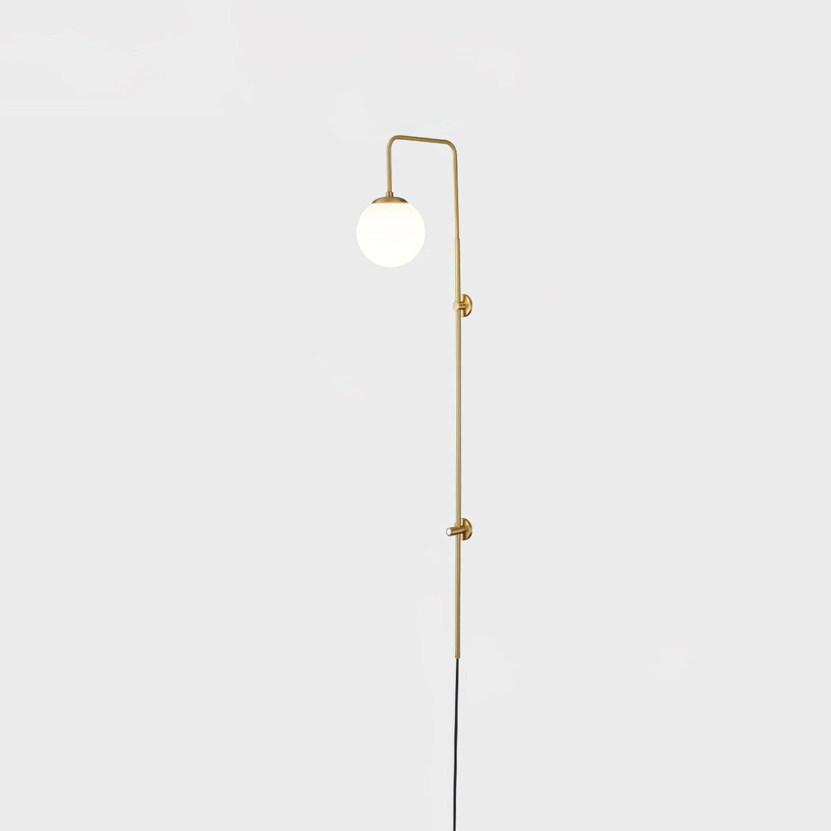 Solenne Globe Brass Plug-in Wall Sconce