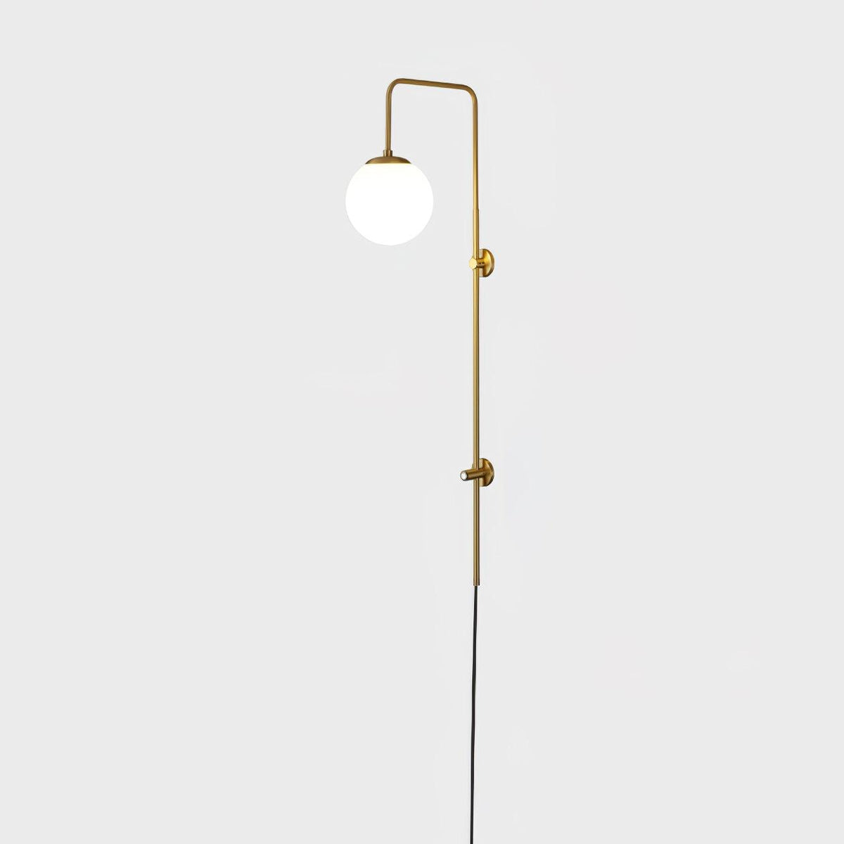 Solenne Globe Brass Plug-in Wall Sconce
