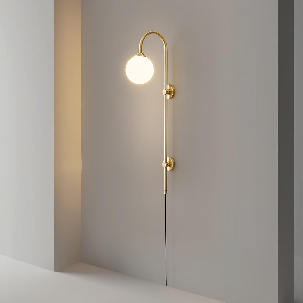 Solenne Globe Brass Plug-in Wall Sconce