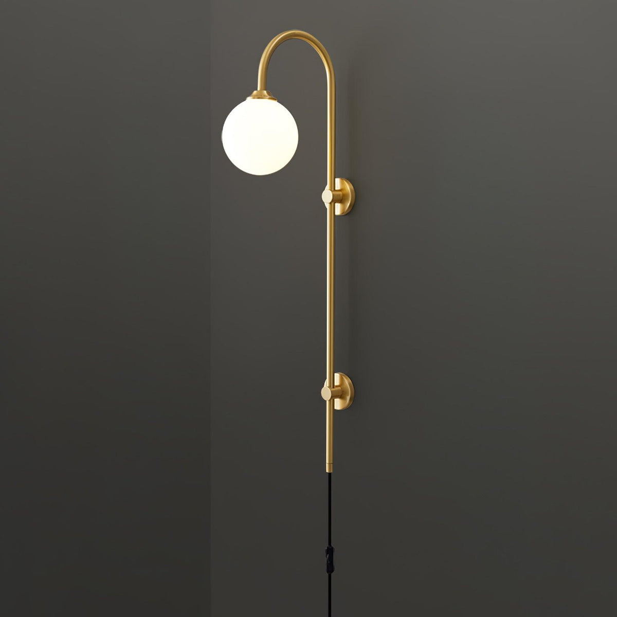 Solenne Globe Brass Plug-in Wall Sconce