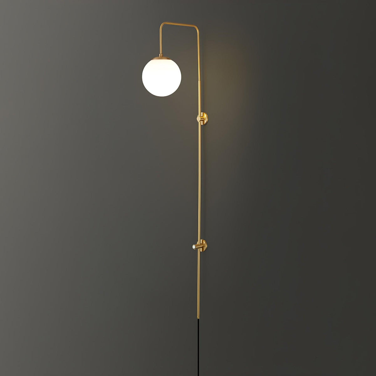 Solenne Globe Brass Plug-in Wall Sconce